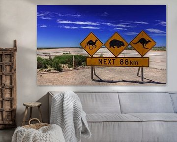 Verkeersborden aan het begin van de Nullarbor road, een weg door de leegte van het zuiden van Austra van Coos Photography