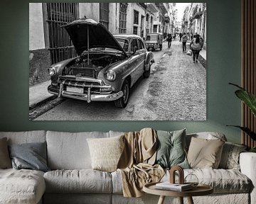 Vintage car with open hood in old town of Havana Cuba in black and white by Dieter Walther