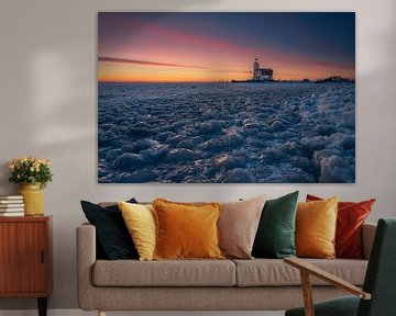 Winter at the lighthouse of Marken by Raoul Baart