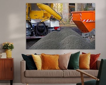 Construction vehicles and equipment applying a concrete ring to an old grain elevator. by Babetts Bildergalerie