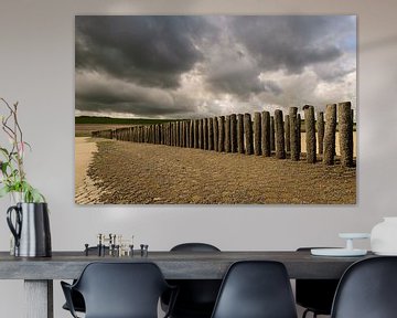 Groyne with dark clouds by Edwin van Amstel