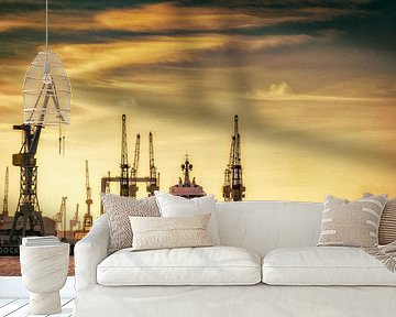 Dry dock and ship in the port of Hamburg at sunset by Dieter Walther