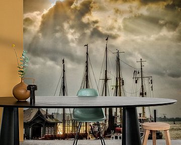 Ships in the museum harbour Övelgönne Hamburg and clouds against the light by Dieter Walther