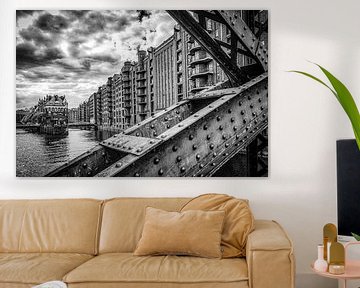 Bridge and facades in Speicherstadt Hamburg in black and white by Dieter Walther