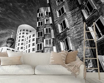 Gehry buildings in the media harbour in Düsseldorf with Rhine tower in black and white by Dieter Walther