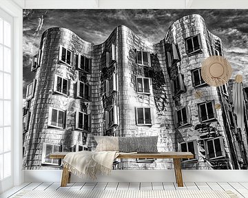 Gehry buildings in the media harbour in Düsseldorf with metal facade in black and white by Dieter Walther