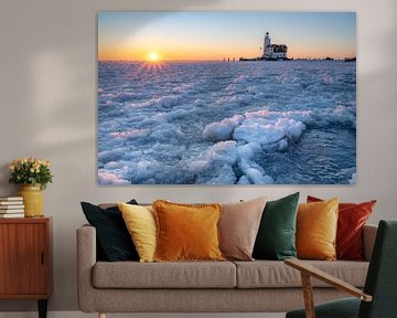 Lighthouse in frozen lake by Tim Vlielander