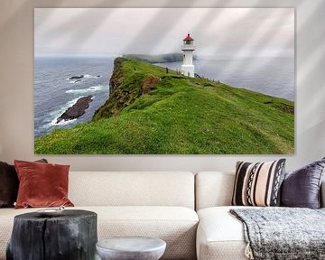 Lighthouse on a small island, Mykines, Faroe Islands