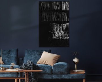 Armchair in front of a record shelf by Thomas Procek