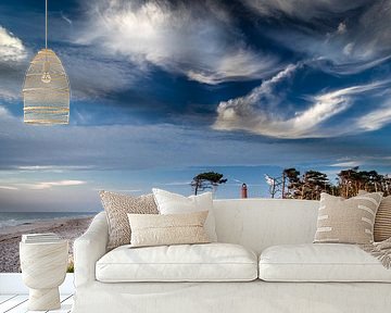 Glowing clouds at the lighthouse Darßer Ort. by Sascha Kilmer