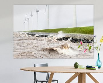 Windturbines aan de IJsselmeeroever in een storm van Sjoerd van der Wal