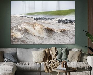 Wind turbines at the IJsselmeer shore in a storm