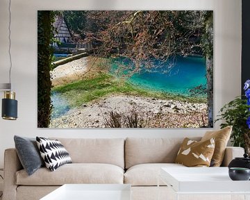 Close up of Blautopf lake in Blaubeuren in Germany with green algae by creativcontent