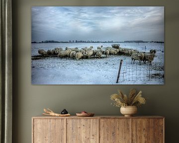 Un troupeau de moutons dans la neige sur Henk Vrieselaar