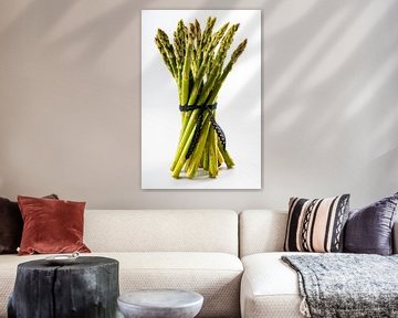 A bundle of fresh green asparagus with white background by Dafne Vos