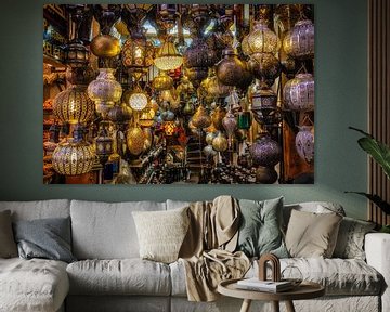Bazaar with many different oriental lamps in Medina of Marrakech in Morocco by Dieter Walther