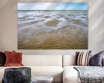 Ebb and flow on the beach of Ameland by Rob IJsselstein