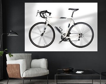 Racing bicycle in white with black and grey details by Sjoerd van der Wal