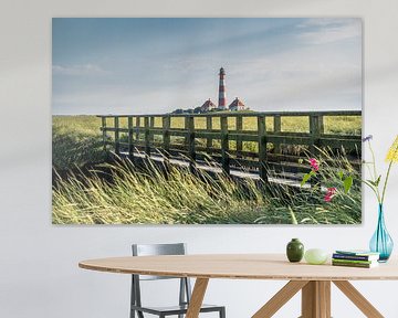 Brücke vor dem Westerheversand Leuchtturm an der Nordsee von Animaflora PicsStock