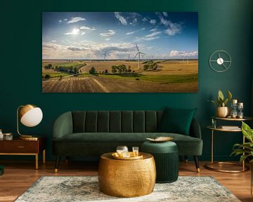 Panorama of a beautiful landscape with wind turbines in good weather by Jonas Weinitschke