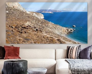 Panorama with goats and a blue sea on the island of Folegandros in Greece by Teun Janssen