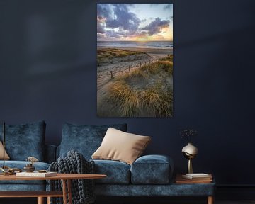 Zonsondergang aan duinen en strand van Dirk van Egmond
