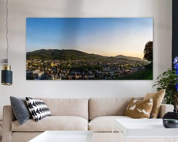 Freiburg im Breisgau at dawn in warm sunset light XXL panorama of city by adventure-photos