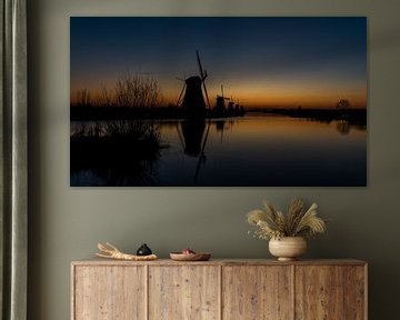 Daybreak at the windmills of Kinderdijk, UNESCO world heritage. by Jaap van den Berg