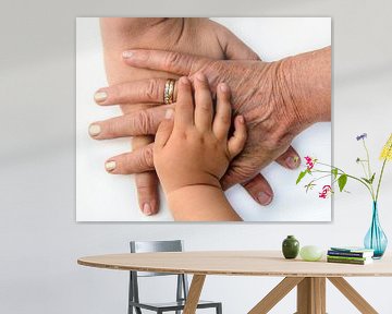 Zusammenhalt Hände von 3 Generationen einer Familie übereinander von Dieter Walther