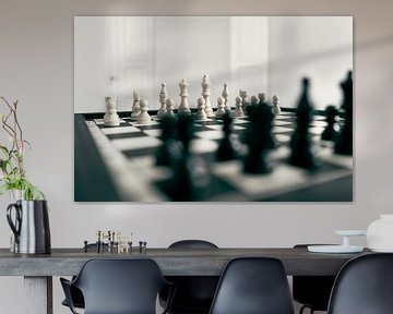 Chessboard in white room by Bert-Jan de Wagenaar