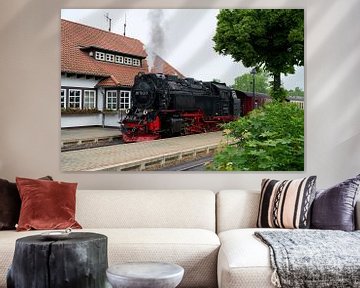 Steam locomotive of the Brockenbahn in the station of the city of Wernigerode in Germany by Heiko Kueverling