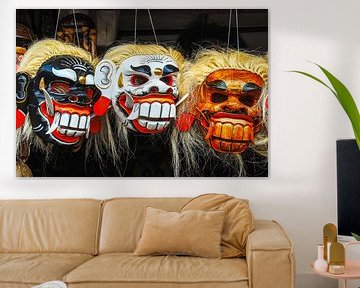 colorful traditional masks made of wood in Bali Indonesia by Dieter Walther