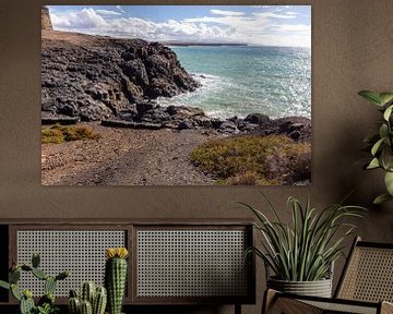 Panoramisch uitzicht op de rotsachtige kust van El Cotillo op het Canarische eiland Fuerteventura van Reiner Conrad