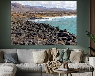 Panoramisch uitzicht op de rotsachtige kust van El Cotillo op het Canarische eiland Fuerteventura van Reiner Conrad