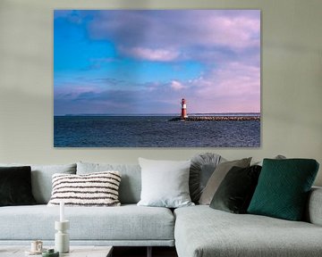 Pier and pier tower on the Baltic coast in Warnemünde by Rico Ködder