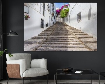 Stairs in a street between white houses in Altea by Marc Venema