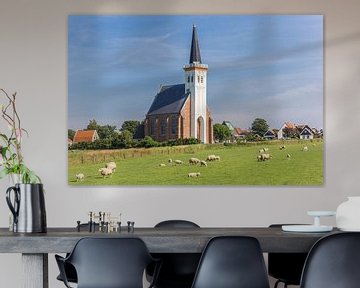 Sheep in the meadow in front of the church of Den Hoorn on Texel by Marc Venema