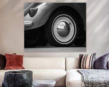 Volkswagen Beetle reflection in wheel by Ronald van der Zon