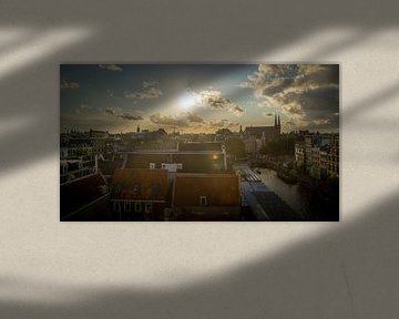 Luchtfoto van Amsterdam tijdens zonsondergang