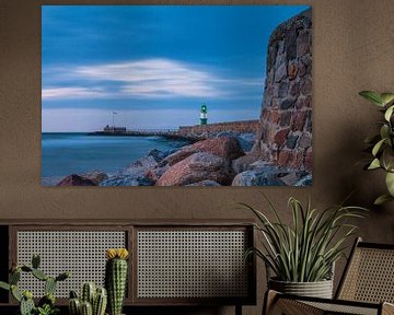 Pier and pier tower on the Baltic coast in Warnemünde by Rico Ködder