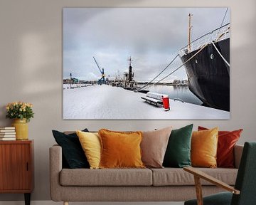 View over the city harbour in Rostock in winter by Rico Ködder
