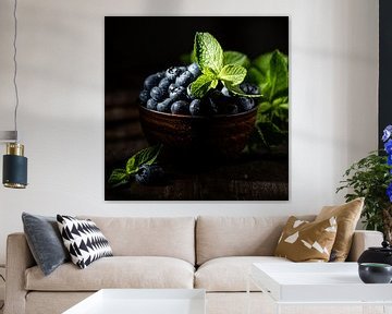 Blueberries with mint leaves in brown bowl by Iryna Melnyk