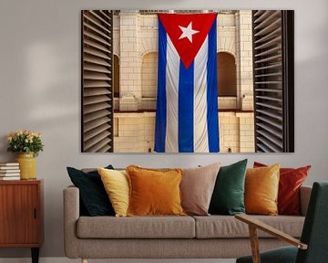 Large Cuban flag hangs in the patio of the Revolution Museum in Havana, Cuba by WorldWidePhotoWeb