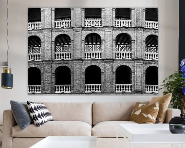 Facade with arches bullring in Valencia Spain in black and white by Dieter Walther