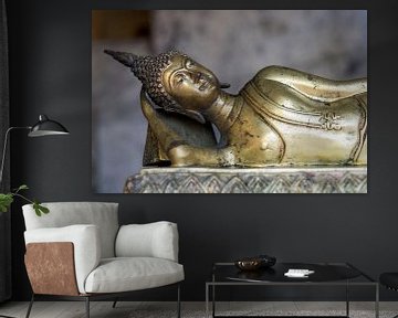 A bronze Buddha asleep by Rick Van der Poorten