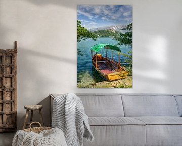 traditional wooden boat ( Pletna ) on Lake Bled by Peter Eckert