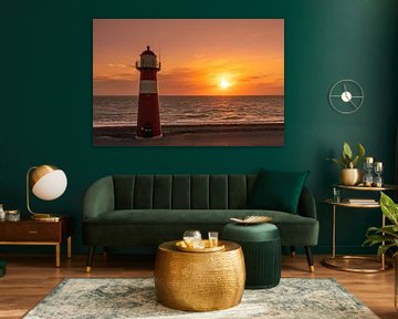 Zonsondergang bij de vuurtoren van Westkapelle van Rick van de Kraats
