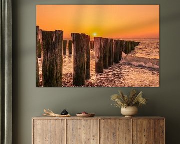 Sunset Domburg with wave breakers