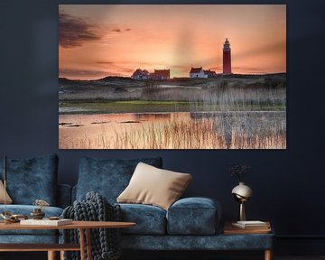 Zonsondergang Texel vuurtoren. van John Leeninga