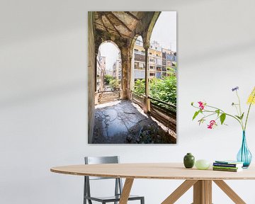 Corridor with city view in abandoned palace.